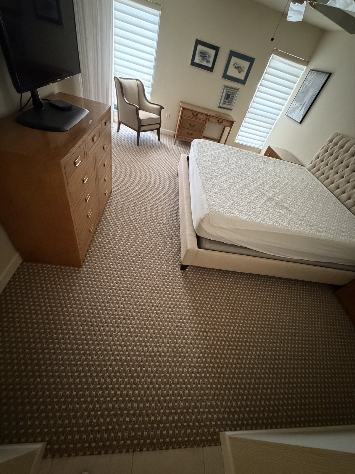 Bedroom in patterned neutral carpet